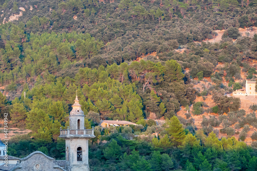 View of the pretty Mallorcan village of Valldemossa, in the protected natural area of the Sierra de Tramuntana, on a sunny summer morning photo