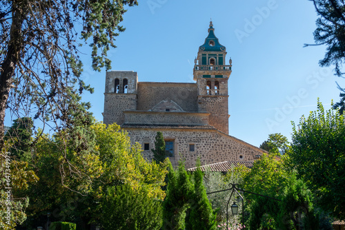 View of the pretty Mallorcan village of Valldemossa, in the protected natural area of the Sierra de Tramuntana, on a sunny summer morning photo