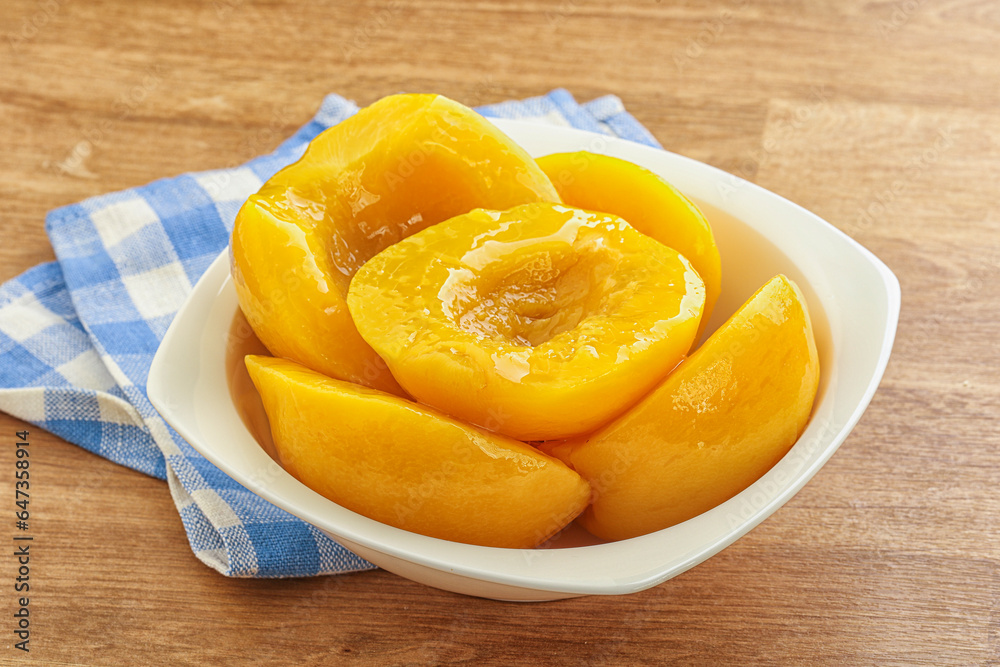 Sweet canned peaches with syrope Sweet canned peaches with syrope