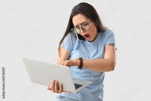 Stressed young woman with w...