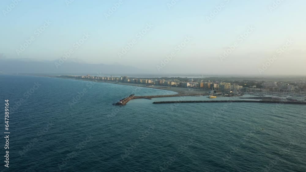 The urban heart and maritime access in Europe, in France, in Occitanie, in the Pyrenees Orientales, in Argeles, On the edge of the Mediterranean Sea, in summer, during 'a sunny day. The urban heart and maritime access in Europe, in France, in Occitanie, in the Pyrenees Orientales, in Argeles, On the edge of the Mediterranean Sea, in summer, during 'a sunny day.