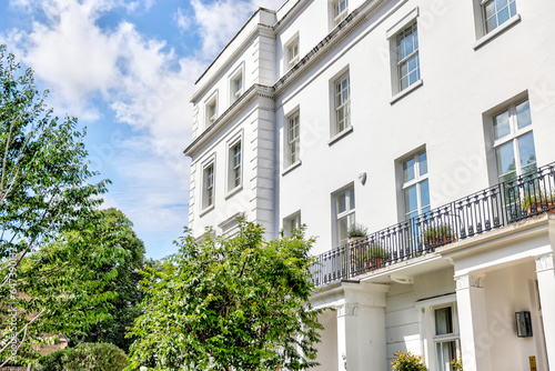 London, England - July 11, 2023: Walk up apartment buildings in Mayfair and Knightsbridge seen from the street in London
