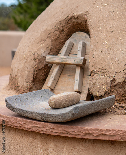Close-up of Grinding Stone with Trough-shaped Metates and Horno Oven