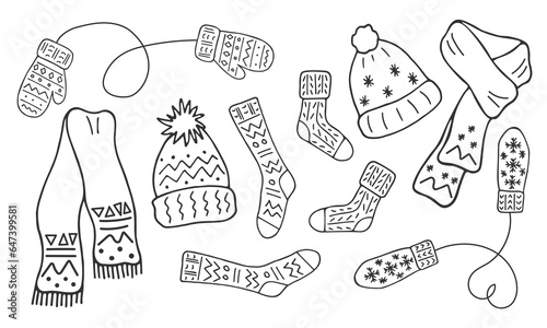 Warm knitted clothes set. Winter autumn accessories collection in doodle style. Hats, mittens, socks, scarves isolated. Line drawn illustration