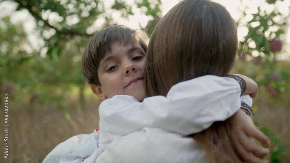 Smiling son hugs mom. Tender family scene. Cute 4 years old kid with mommy Smiling son hugs mom. Tender family scene. Cute 4 years old kid with mommy