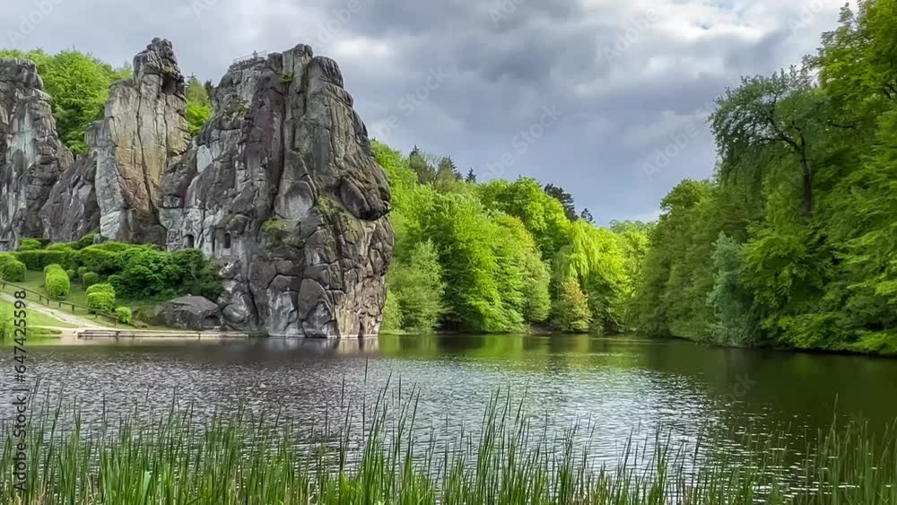 Landscape Exer Stones, also Easter, Register or Egger Stones, group of rocks in Teutoburg Forest near Horn-Bad Meinberg, Lippe region, North Rhine Westphalia, Germany, Vertical video. High quality 4k Landscape Exer Stones, also Easter, Register or Egger Stones, group of rocks in Teutoburg Forest near Horn-Bad Meinberg, Lippe region, North Rhine Westphalia, Germany, Vertical video. High quality 4k