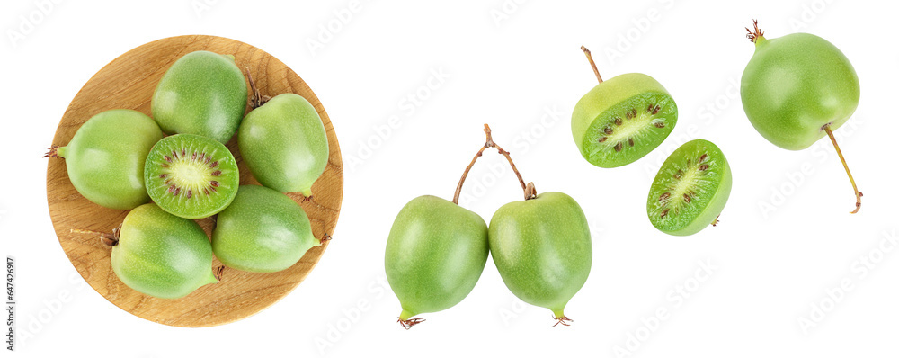 mini kiwi baby fruit or actinidia arguta in wooden bowl isolated on white background with full depth of field. Top view. Flat lay mini kiwi baby fruit or actinidia arguta in wooden bowl isolated on white background with full depth of field. Top view. Flat lay