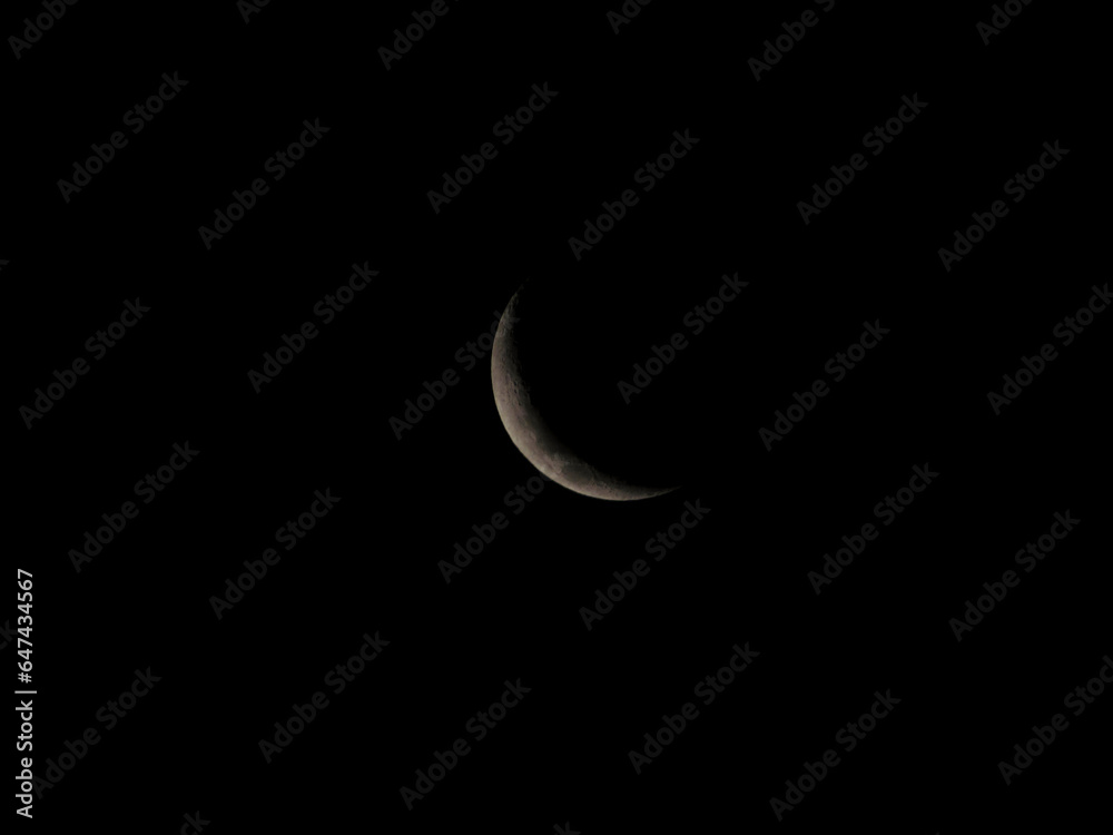 Crescent moon or concave crescent moon(Moon on the rise to Quarter Crescent), observed at night in the southern hemisphere. Crescent moon or concave crescent moon(Moon on the rise to Quarter Crescent), observed at night in the southern hemisphere.