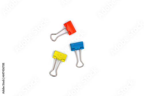 Colorful binder clips isolated on a white background 