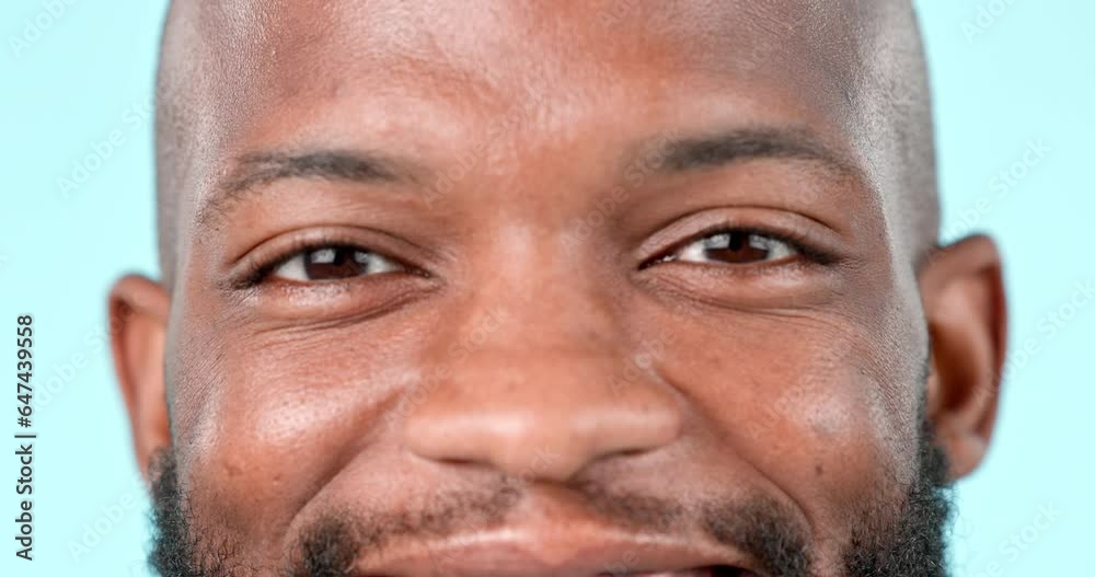 Eyes, vision and hope with a happy black man closeup in studio on blue background for a dream or aspiration. Portrait, face or eyesight and a confident young person looking peaceful with satisfaction Eyes, vision and hope with a happy black man closeup in studio on blue background for a dream or aspiration. Portrait, face or eyesight and a confident young person looking peaceful with satisfaction