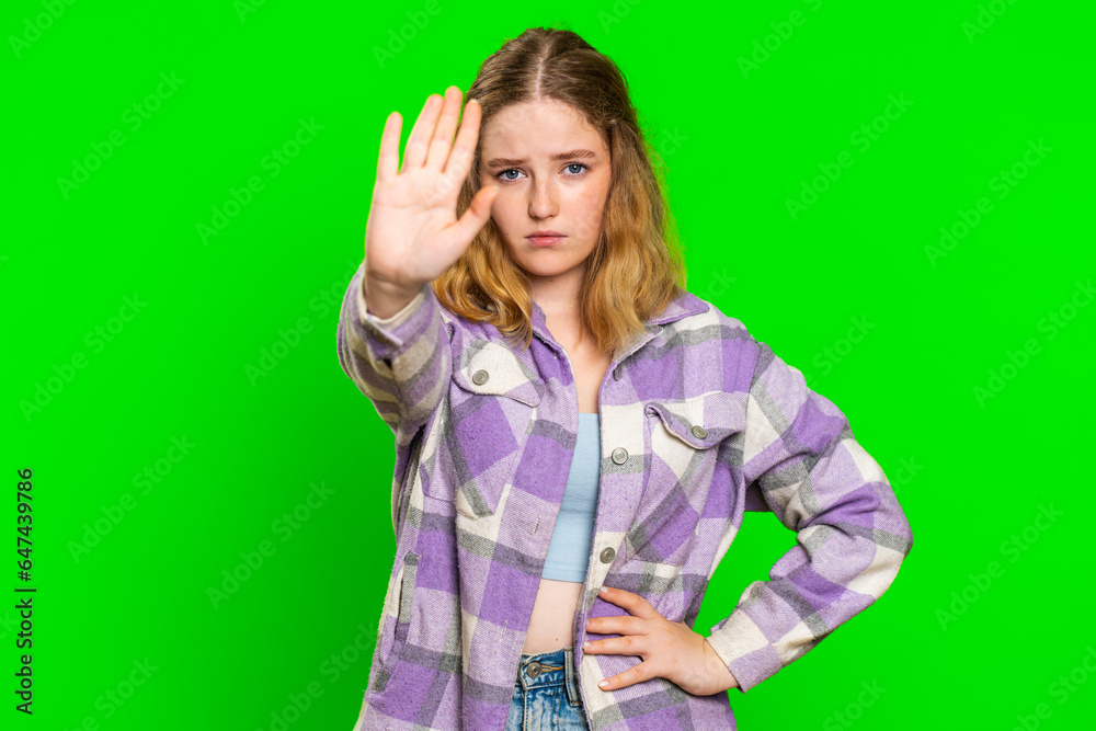 Stop, enough. Caucasian woman say no hold palm folded crossed hands in finish gesture, warning of finish, prohibited access, declining communication body language danger. Girl on chroma key background Stop, enough. Caucasian woman say no hold palm folded crossed hands in finish gesture, warning of finish, prohibited access, declining communication body language danger. Girl on chroma key background