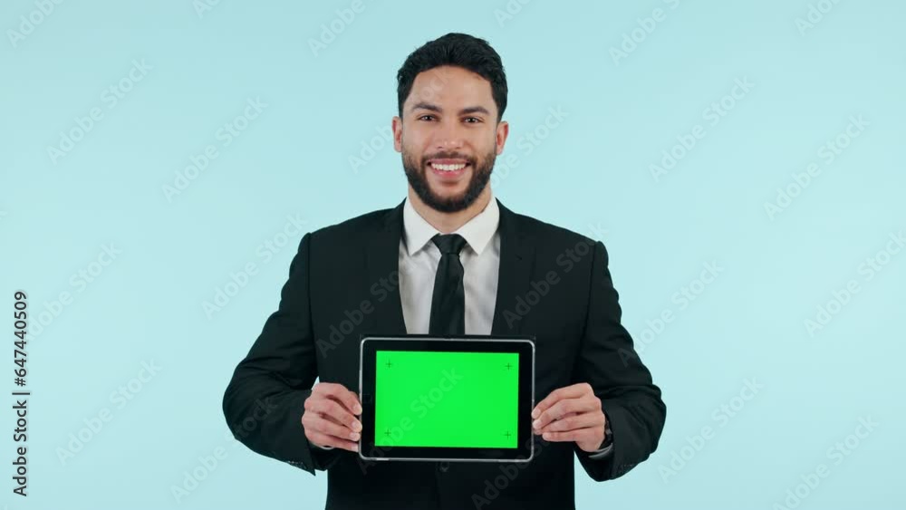 Businessman, tablet and green screen in studio for marketing or advertising tracking markers on blue background. Smile, person and digital tech with product placement or design for social media web Businessman, tablet and green screen in studio for marketing or advertising tracking markers on blue background. Smile, person and digital tech with product placement or design for social media web