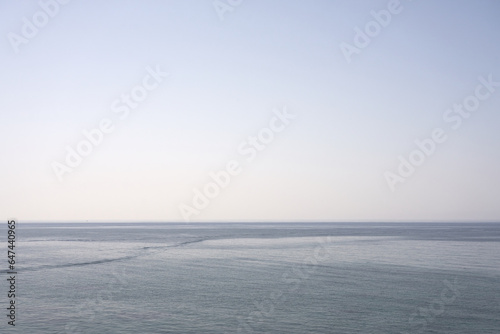 The horizon line in the fog on the Mediterranean Sea as a background.