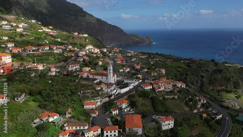 Beautiful aerial footage in Penha d'Águia rocks and local villages area one of Madeira's most outstanding geological symbols photo