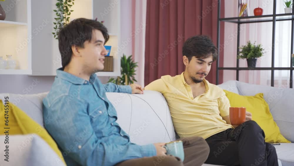 Friends are drinking coffee together at home and chatting. Friends are drinking coffee together at home and chatting.