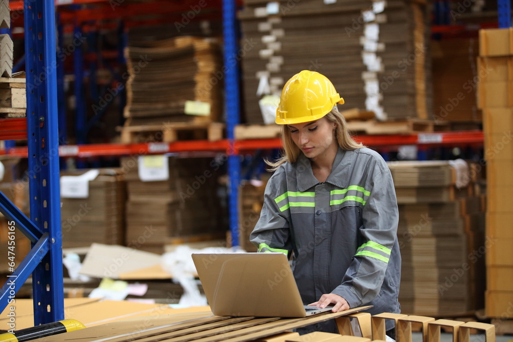 worker or engineer working in factory with safety uniform , safety hat and safety glasses , image is safety concept or happy workplace worker or engineer working in factory with safety uniform , safety hat and safety glasses , image is safety concept or happy workplace