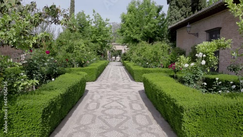 a zoom in clip of the gardens of the convent de san francisco at the ancient palace-fortress alhambra of grenada, spain