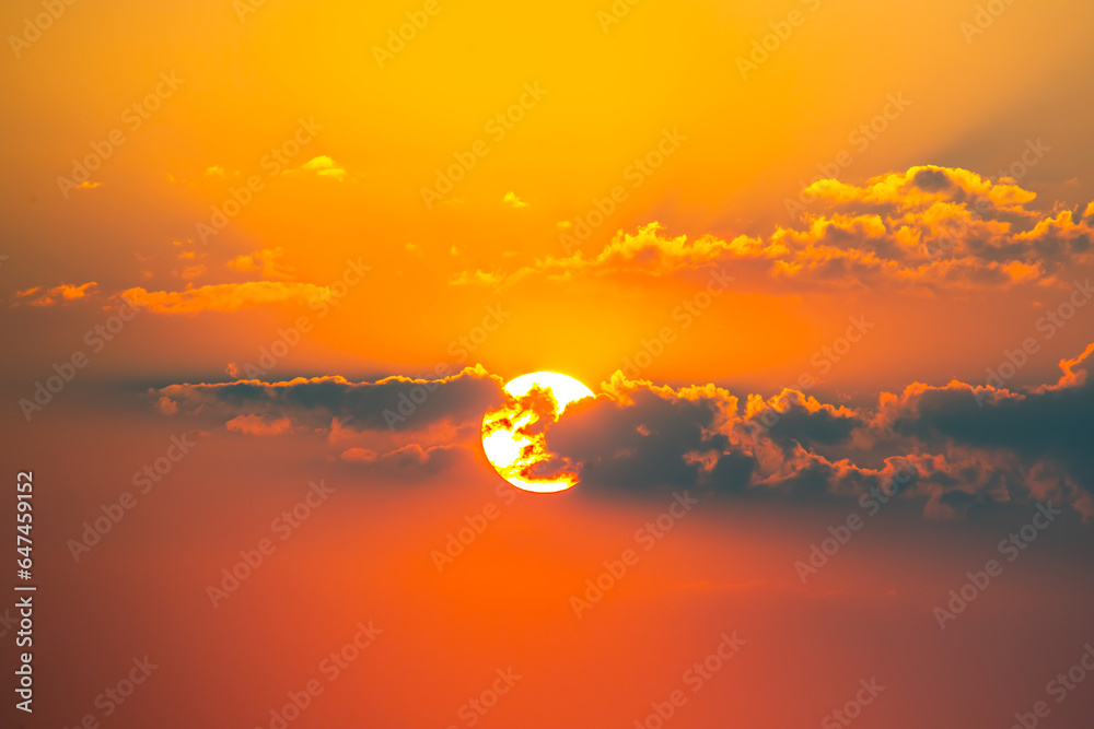 Fototapeta premium Colorful clouds in the sky at sunset. Landscape in nature. Bright and juicy evening colored sky