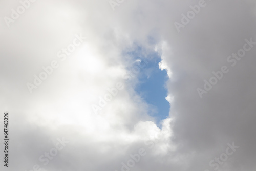 Canvas Print White and grey clouds and blue sky