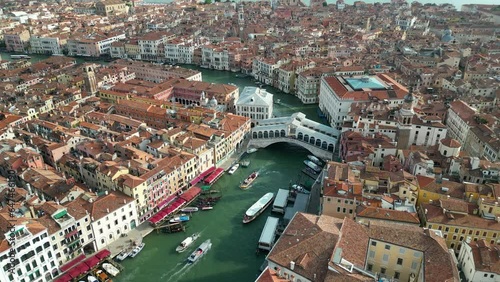 Venice, Aerial view of Rialto bridge crossing the Grand Canal in Venice downtown, Veneto, Italy