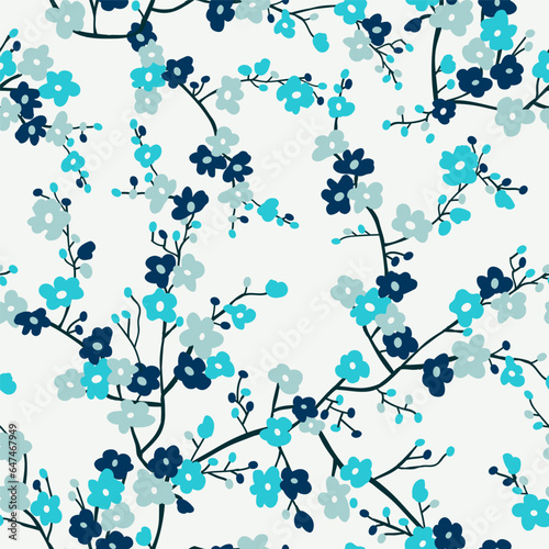 Blue small flower branches pattern inspired by Japanese cherry blossoms. Vector seamless pattern design for textile, fashion, paper, packaging and branding. 