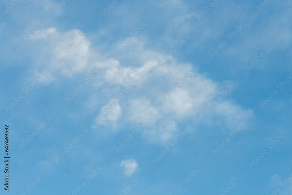 Blue sky with white soft high puffy clouds Blue sky with white soft high puffy clouds