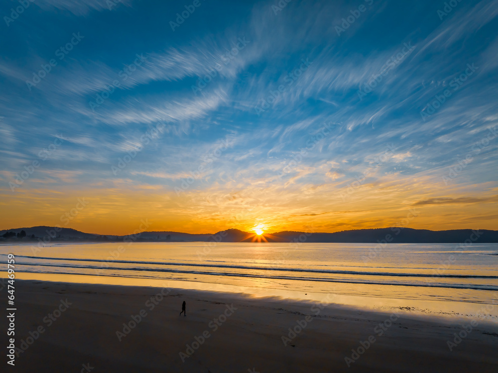 Pretty sunrise at the seaside with high cloud and low tide Pretty sunrise at the seaside with high cloud and low tide
