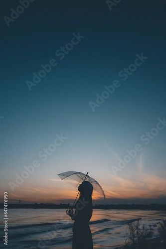 silhouette of a women on the beach at sunset