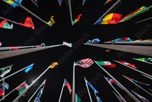 Night view of flags from all over the world