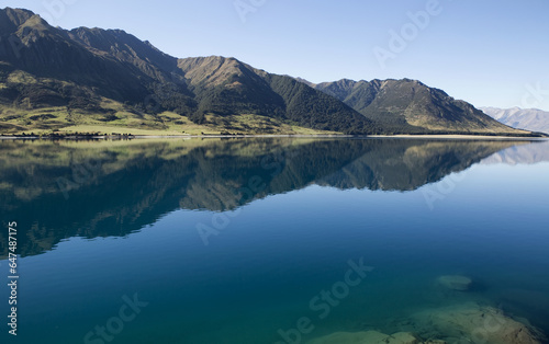 Lake Hawea With Reflections Of Mountains; South Island, New Zealand photo