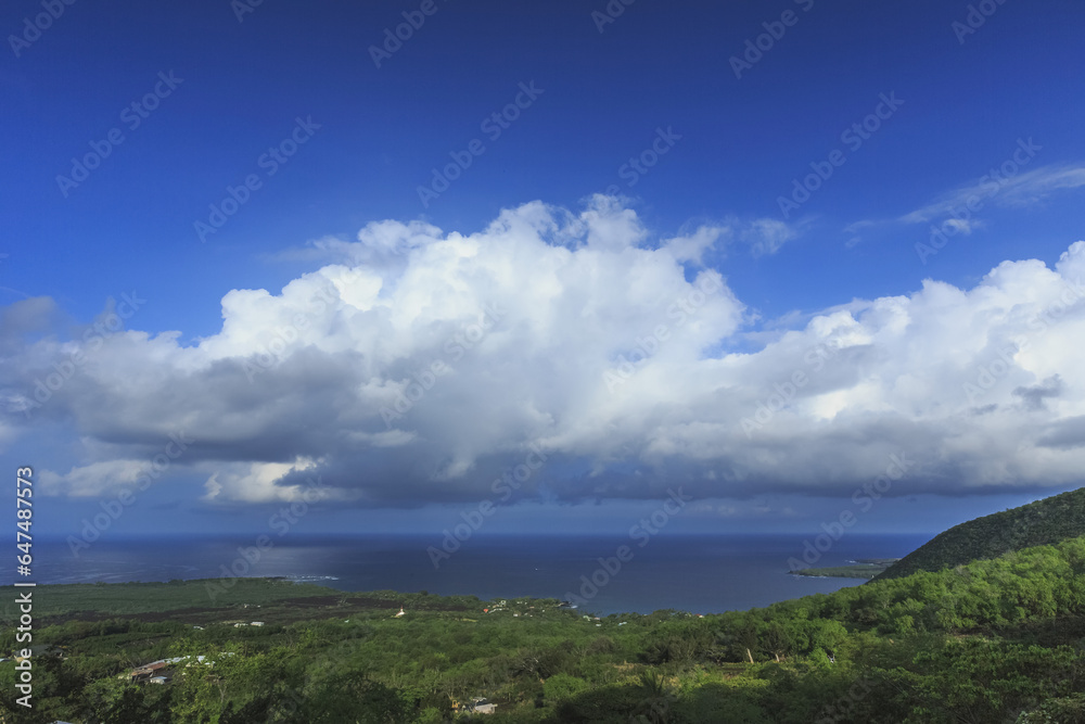 Cumulus Clouds Over Historic Kealakeku Bay, Site Of Captain Cook's Death And Monument; Kona, Island Of Hawaii, Hawaii, United States Of America