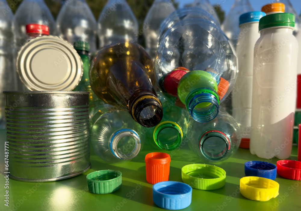 Plastic Recycling. Tin can and plastic Bottle Caps for Recycling. Steel