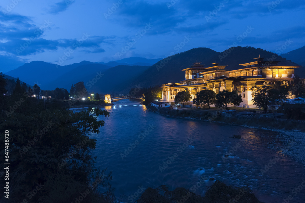 Punakha Dzong Illuminated At Dusk; Punakha, Bhutan Punakha Dzong Illuminated At Dusk; Punakha, Bhutan