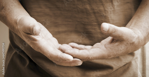 A Man Holding His Hands Out In Front Of Him; Vernon, British Columbia, Canada