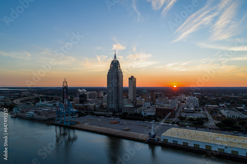 The downtown Mobile, Alabama waterfront skyline at sunset 