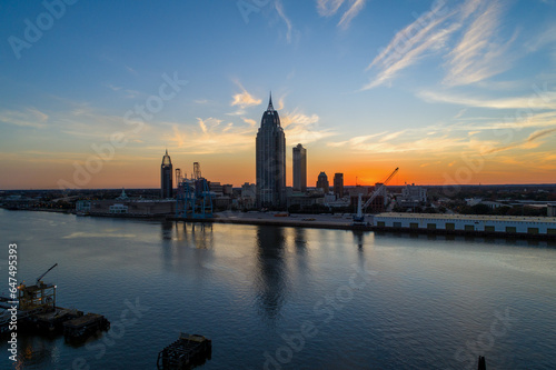 The downtown Mobile, Alabama waterfront skyline at sunset 