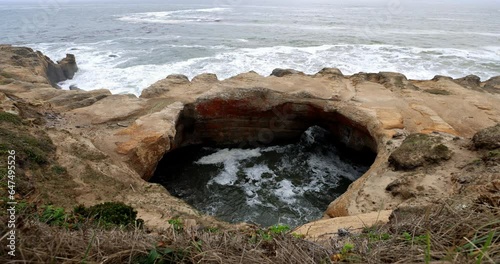 Devils Punch Bowl Arch in Otter Rock, Oregon photo