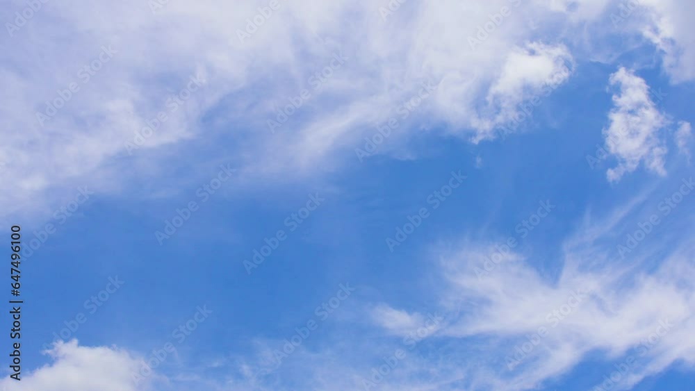 Light clouds move in the sky. Beautiful blue sky The cloud layers in the blue sky move horizontally in opposite directions. Time lapse Light clouds move in the sky. Beautiful blue sky The cloud layers in the blue sky move horizontally in opposite directions. Time lapse