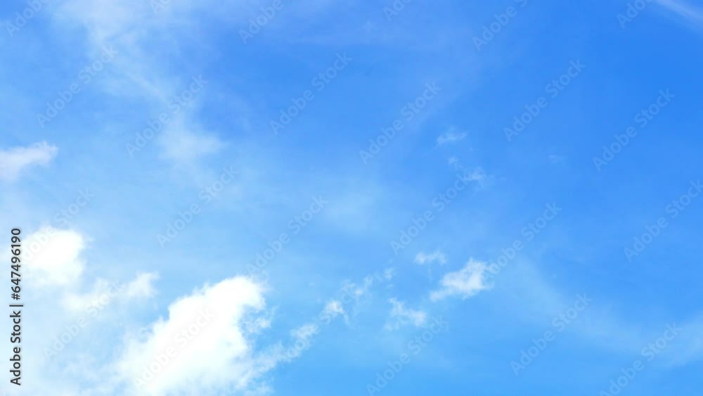 Light clouds move in the sky. Beautiful blue sky The cloud layers in the blue sky move horizontally in opposite directions. Time lapse