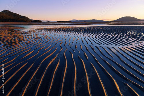 Ripples created by the action of wind, water and tides are revealed as the evening tide receeds, Eagle Beach State Recreation Area (near Juneau), Alaska. photo