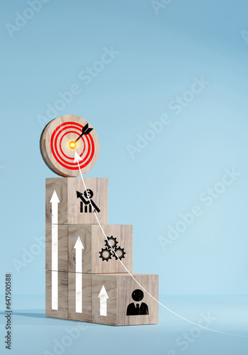 woods block step on table with icon Action plan. target icon on the top of wooden cube blocks. Shining rise up arrow shoot up towards the goal, business growth process.