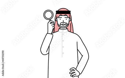 虫メガネをのぞくイスラムのシニア男性