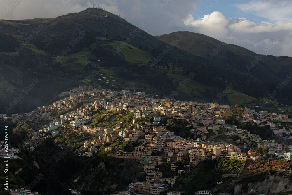 Neighborhoods on the hills surrounding the city of Quito; Quito, Ecuador Neighborhoods on the hills surrounding the city of Quito; Quito, Ecuador