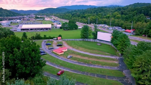 slow push over treetops into drive in theatre in elizabethton tennessee photo