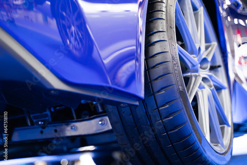 Details about the wheels of a blue super sports car, luxury car © TEEREXZ