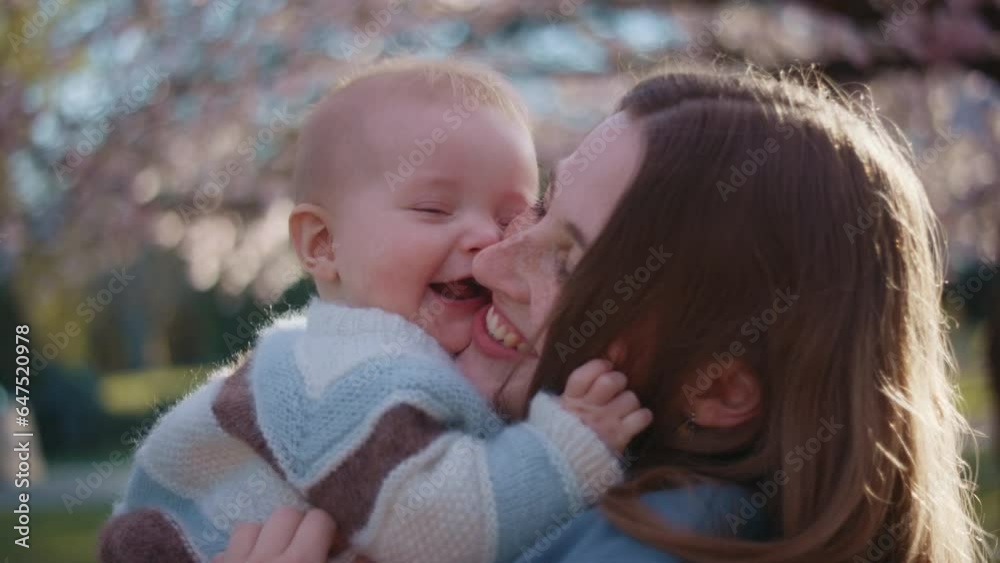 Mother Providing Nurturing Care For Her Child Mother Providing Nurturing Care For Her Child