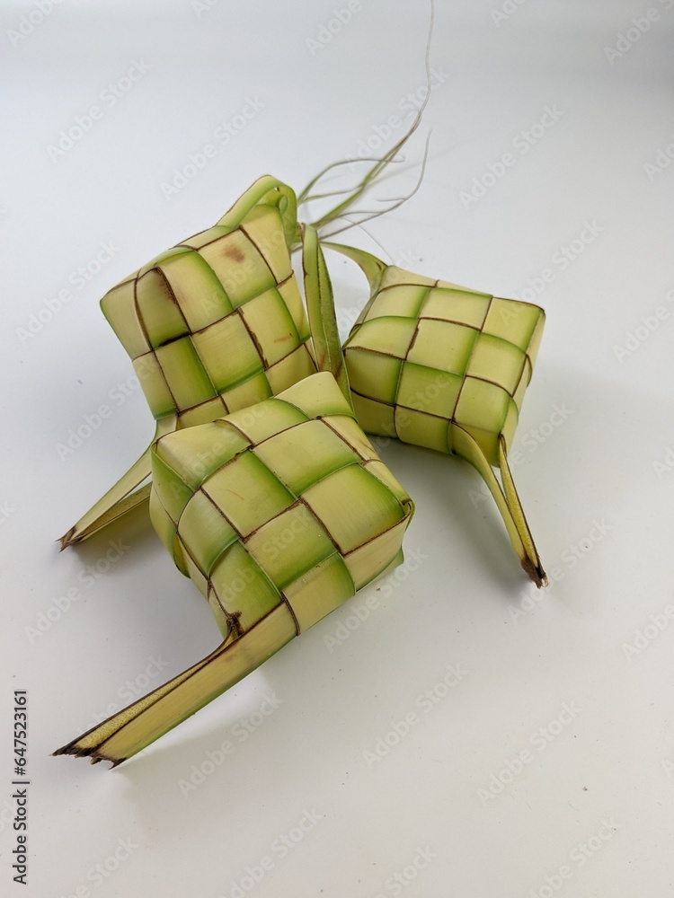 Ketupat (Rice Dumpling) On White Background. Ketupat is a natural rice casing made from young coconut leaves for cooking rice during eid
