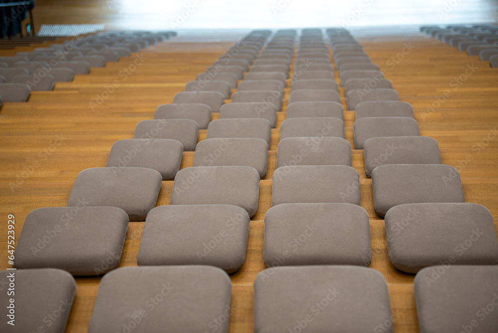 Obraz premium Close-up of cushioned seats in a modern theater auditorium