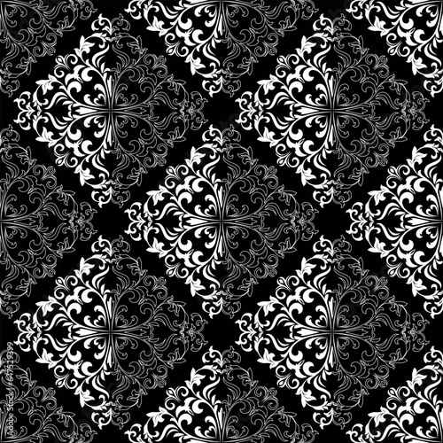 Wallpaper in the style of Baroque. Seamless vector background. White and black floral ornament. Graphic pattern for fabric, wallpaper, packaging. Ornate Damask flower ornament