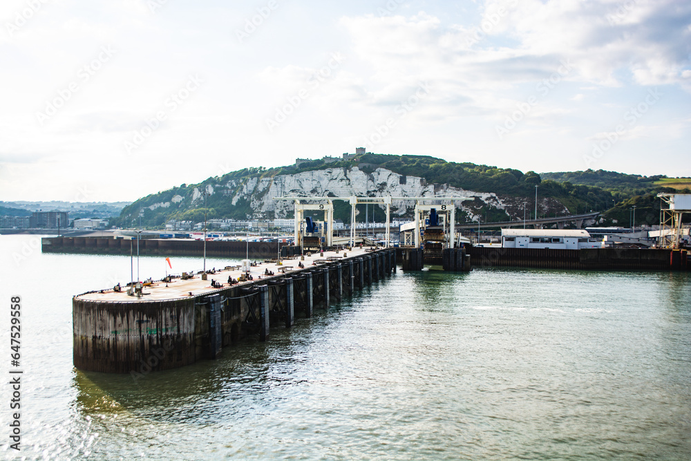 leaving dover on a ferry, seeing harbour in the background